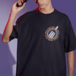 oversized-tee-mockup-of-a-man-posing-with-a-game-controller-to-his-head-m28457 (3) (1)